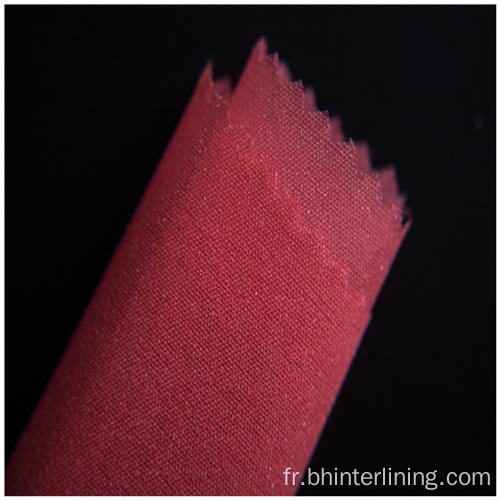 Entoilage adhésif en polyester tissé résistant à la déchirure